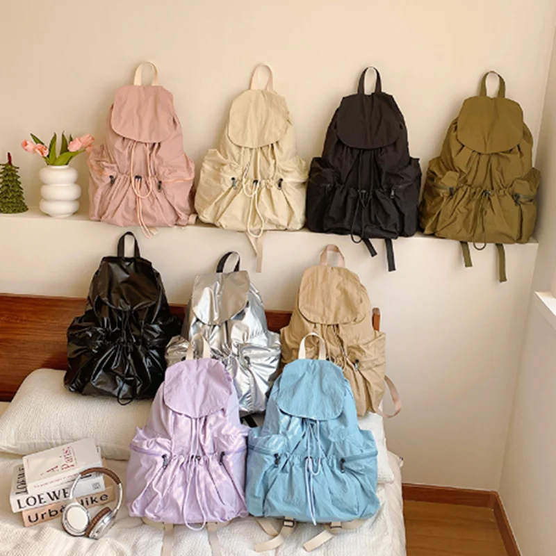 

2025 New Korean version of men's and women's backpacks with fashionable pleated and personalized large-capacity flip covers