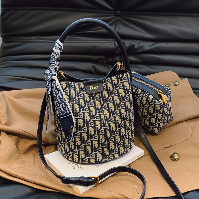 presbyopia light luxury bucket bag handbag women's 2026 new spring high-end sense versatile commuter shoulder messenger bag