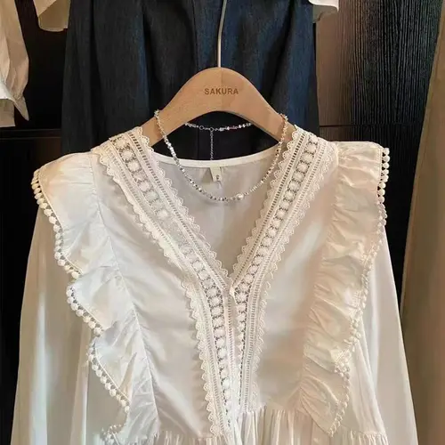 Imagen 2 del producto Camisas para mujer otoño 2025 nuevo abrigo con volantes Irregular manga larga Casual Top con cuello en V sólido moda femenina blusa moda coreana