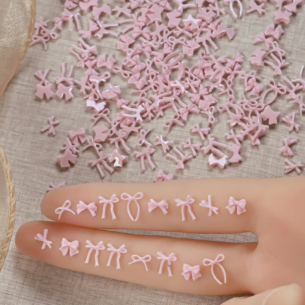 100 pezzi rosa mini bowknot nail art fascino dolce nastro bowknot design scavato nail art strass kawaii papillon manicure parte