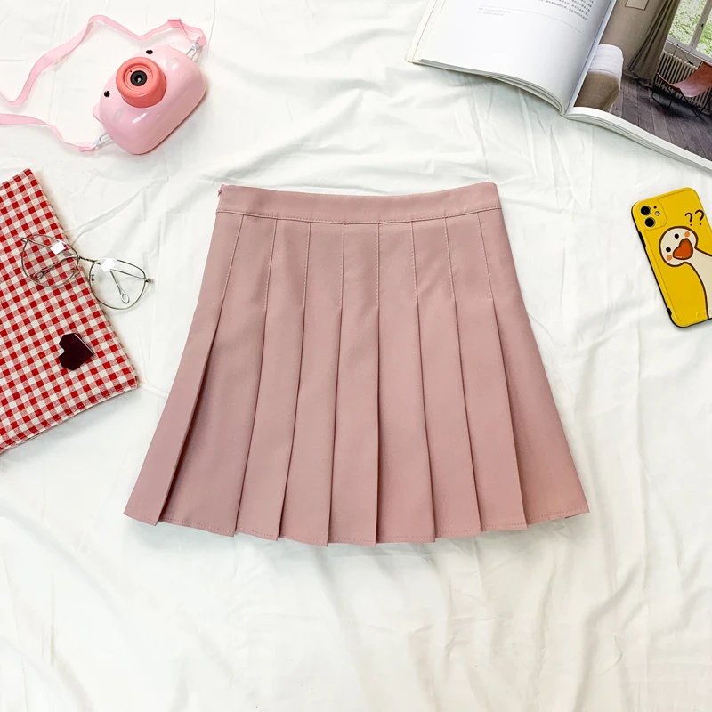 

2026 Корейская версия, женская мини-юбка трапециевидной формы, утягивающая короткая юбка JK в студенческом стиле, всесезонный тренд, солодкие шорты с внутренней частью