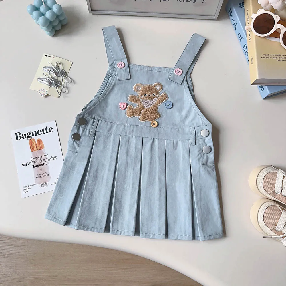 

2026 Summer Hot Sale Children's Solid Color Round Neck T-shirt and Blue Cotton Embroidered Pattern Strap Skirt Two Piece Set