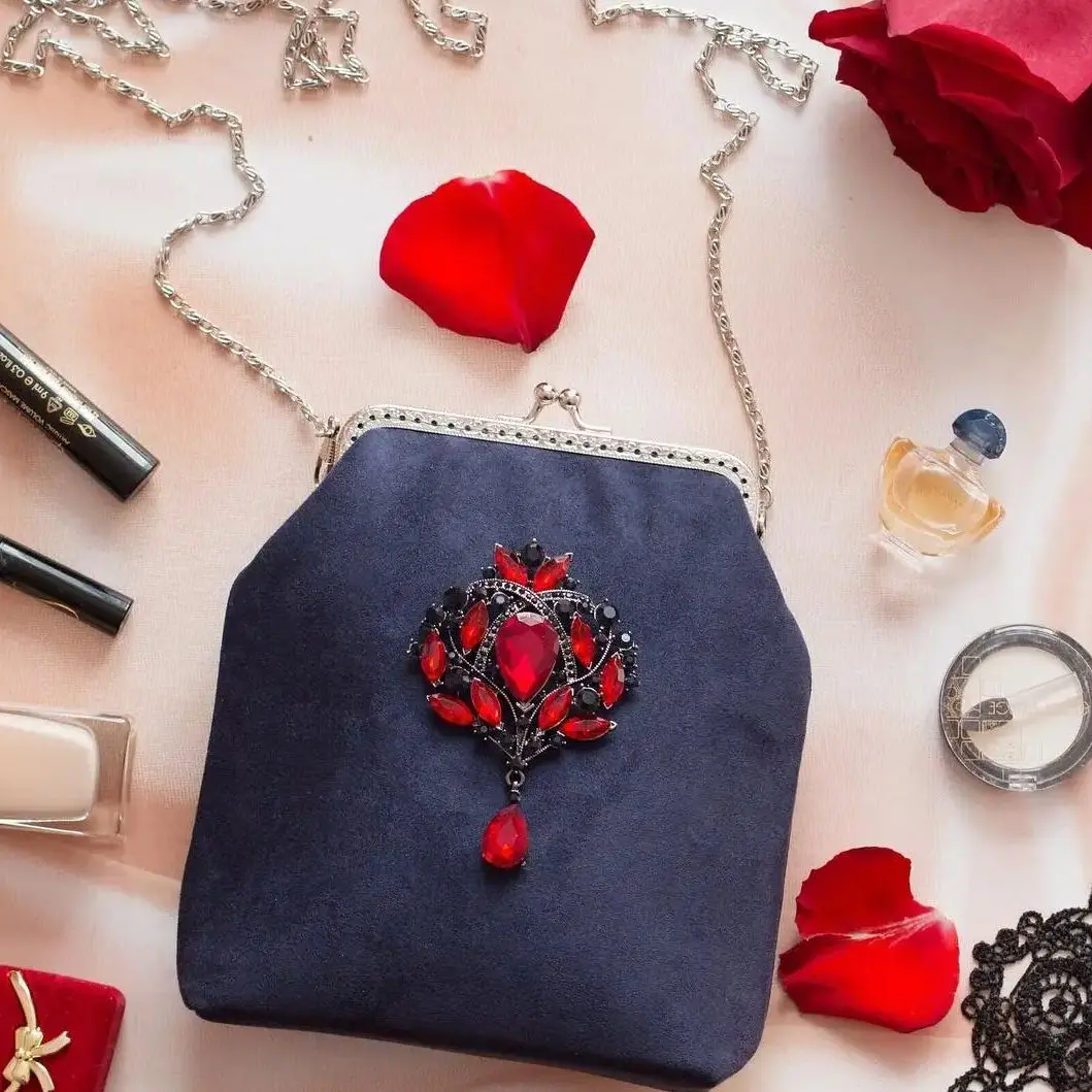 

Lost in Vintage Soild Velvet Fabric Dark Blue Suede and a Large Shiny Luxury Brooch with Red Inserts Evening Clutch 19x17x6cm