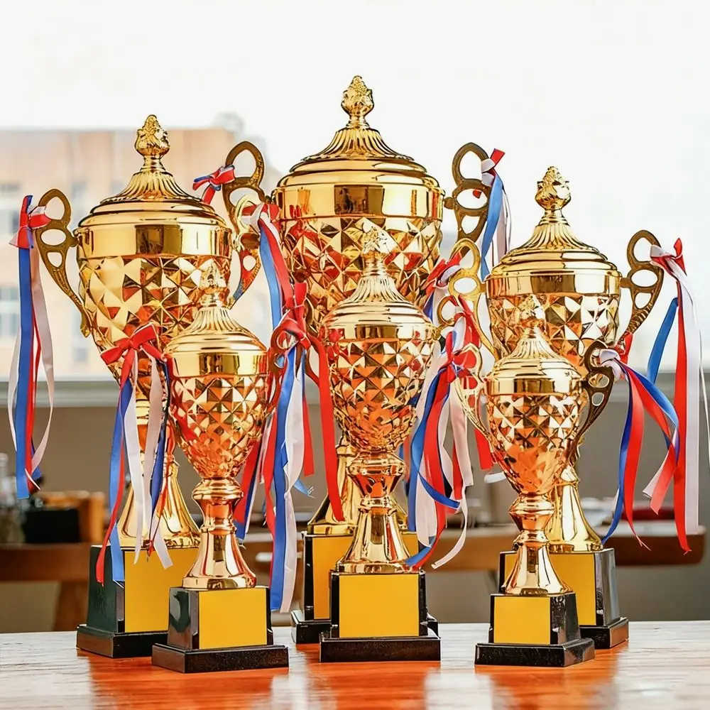 

Creative Award Metal Trophy Metal Material Free Engraving Custom Trophy Display Collection Funny Design Gold Trophies Match