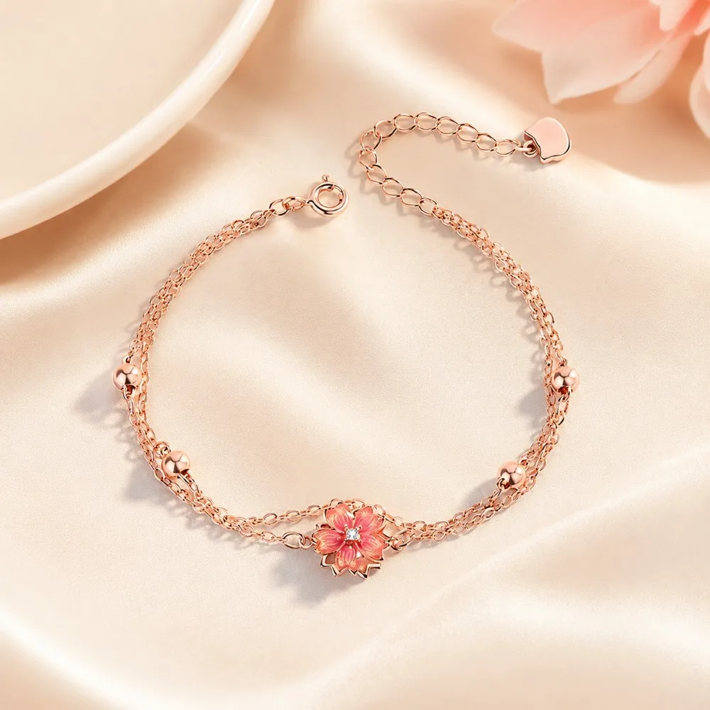 

Rotatable peach blossom four-piece set, plated with 18K rose gold,enamel flowers+rhinestonesembellishment,women'sromanticjewelry
