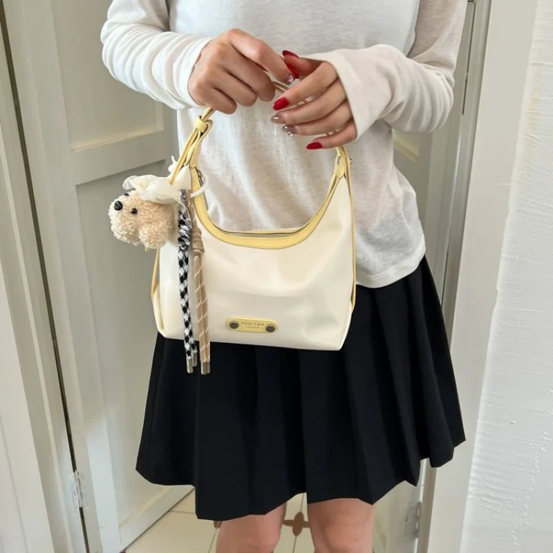 

Sophisticated Women Leather Handbag With Detachable Strap Convertible To Shoulder Bag Or Elegant Clutch