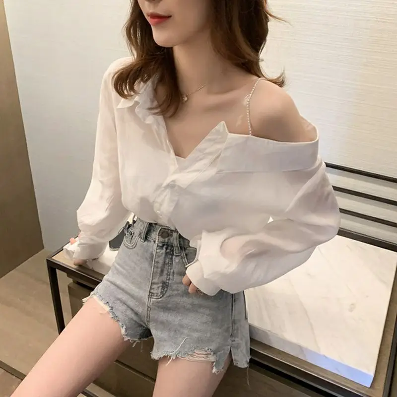 

2023 Spring and Autumn New Korean Style Loose Slimming and Shoulder Hollow Thin Shirt Goddess Design Sense Niche Sexy White Top