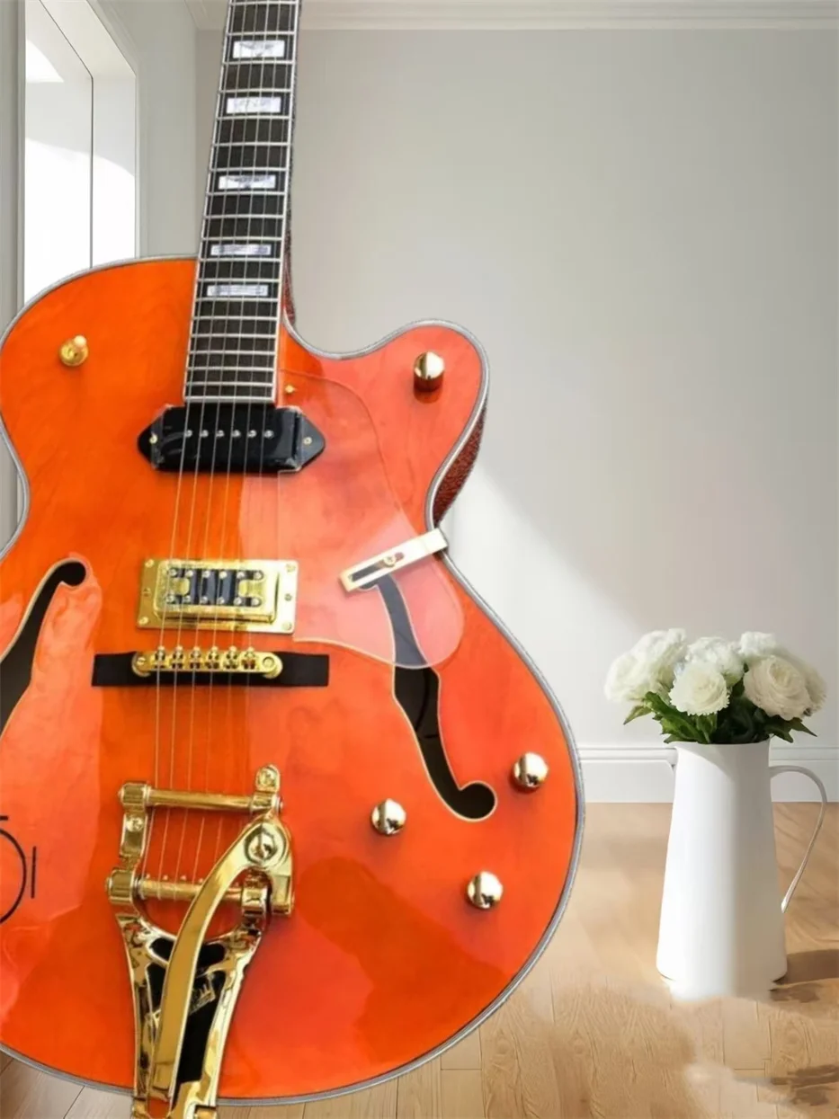Naranja G6120 Eddie Cochran Tribute Jazz Guitarra eléctrica de cuerpo semihueco Puente trémolo grande, pastilla negra P 90, orificios dobles F