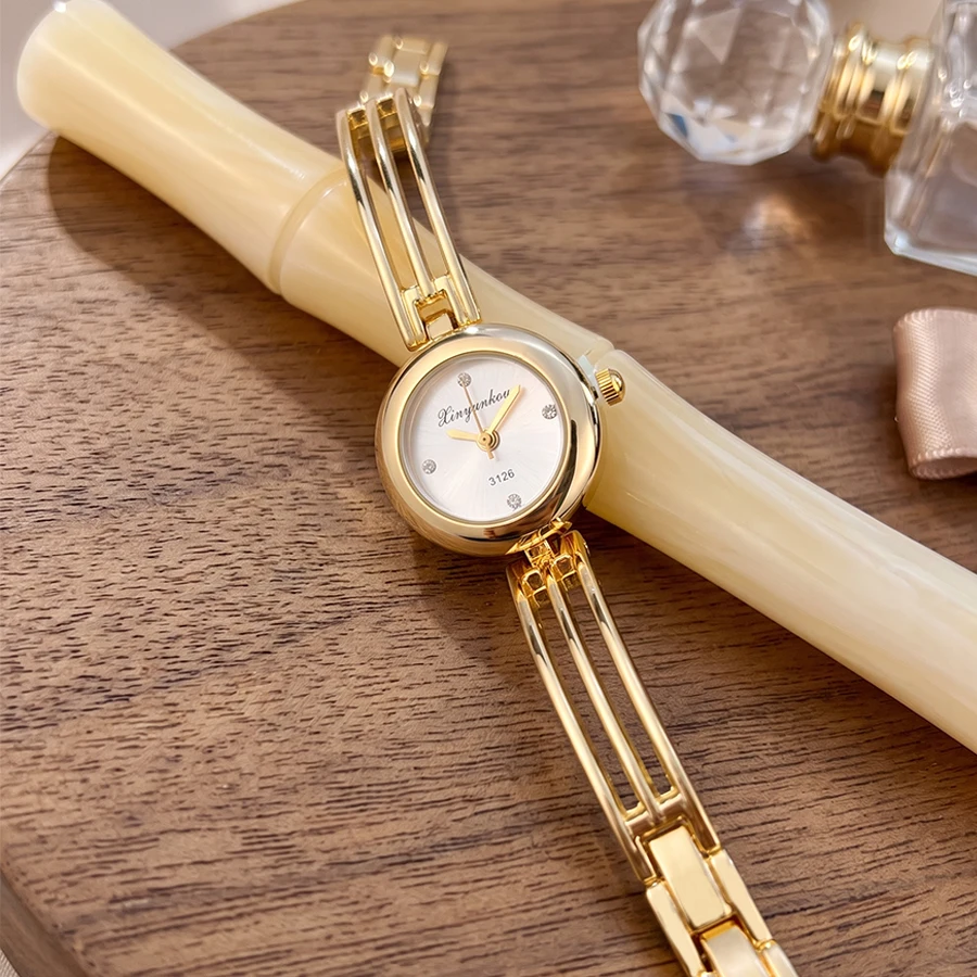 Fashion Round Dial Three-Rod Curved Bracelet Gold Watch for Woman