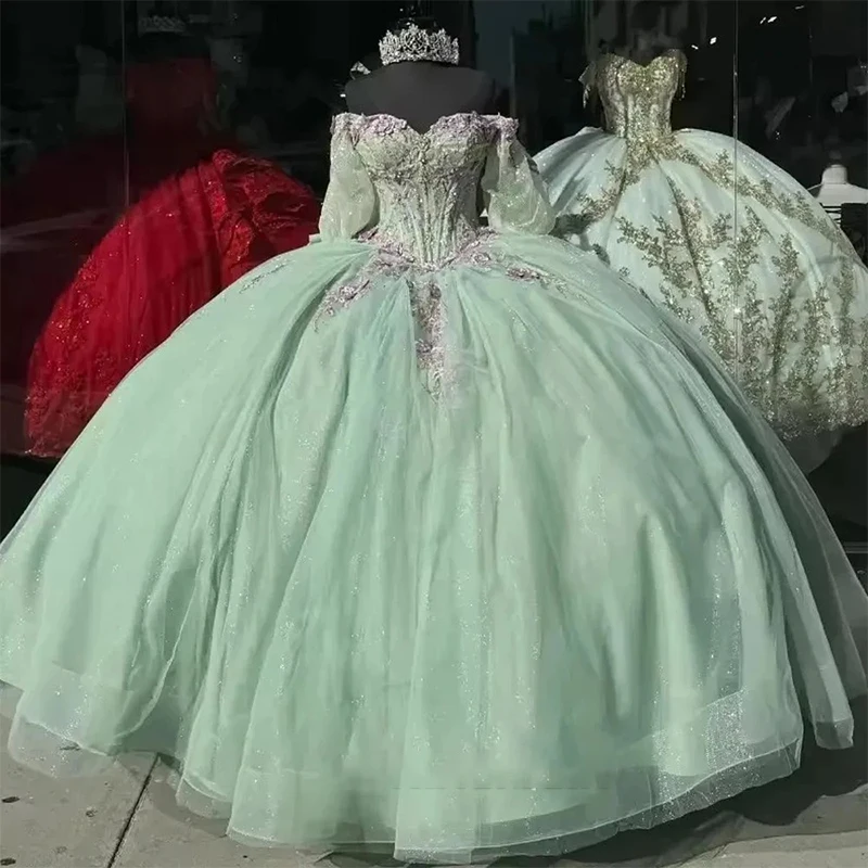 فستان Quinceeneara رشيق من الأورجانزا مع تطريز ترتر ثوب حفلة بأكمام طويلة ورقبة على شكل حرف v مخصص للحفلات الراقصة فيستدو دي نوش