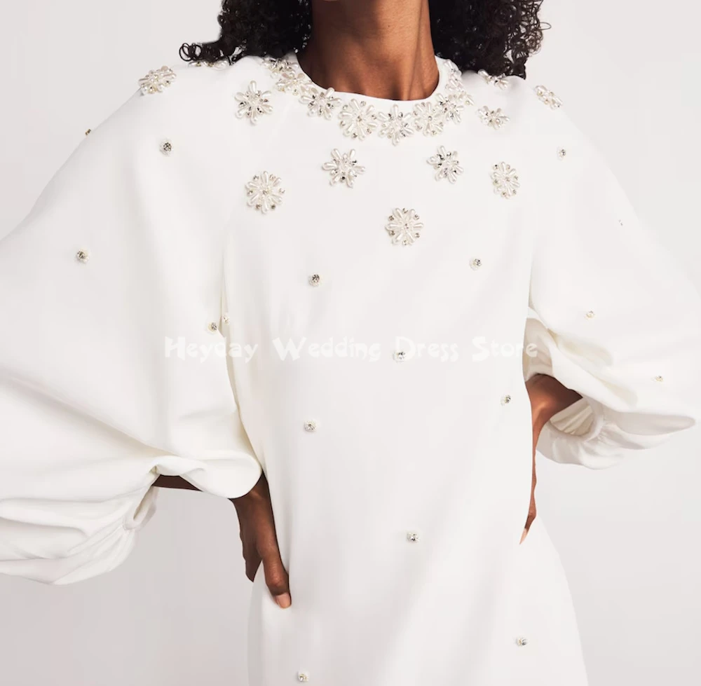 ชุดราตรีทรงตรงแบบมีลูกปัด คอทรงโอ แขนยาว ยาวถึงข้อเท้า ดีไซน์หรูหราสำหรับงานปาร์ตี้  คอลเลคชั่น Heyday Customized สำหรับผู้หญิง ปี 2025