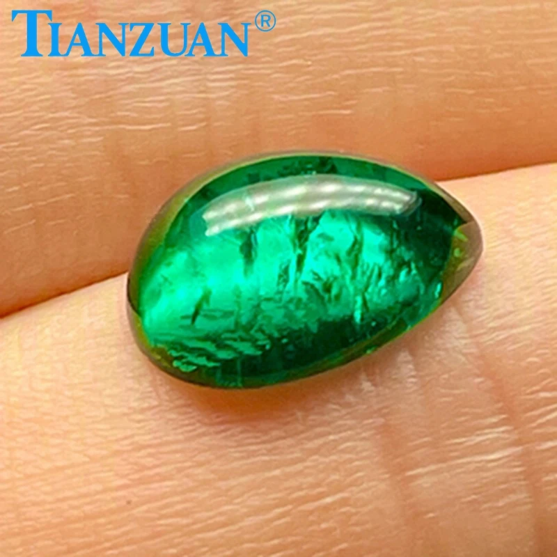 

Hydrothermal Lab-grown Muzo Emerald Cabochon Cut Pear Shape Including Minor Cracks Inclusions Loose Gemstone