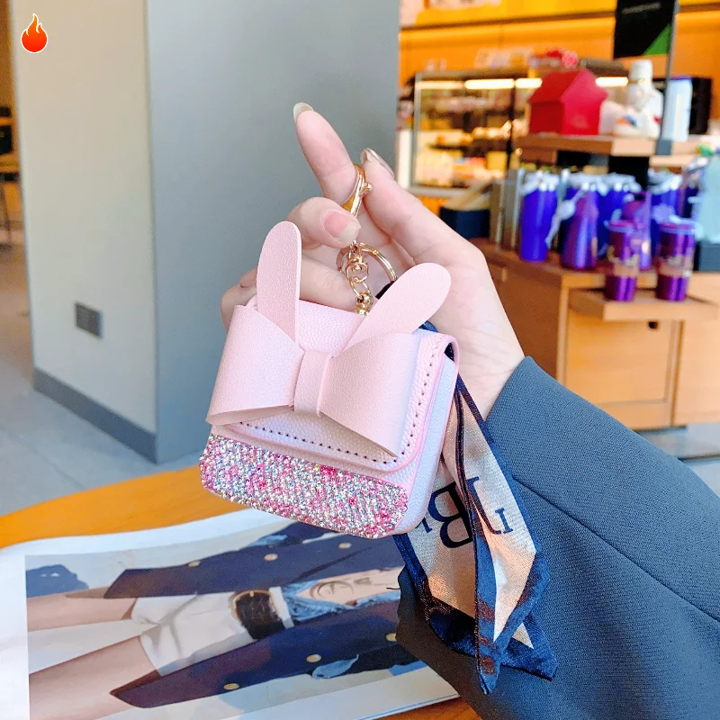 

Стильная мини-сумка для губной помады с кроличьими ушками, сумка для наушников из искусственной кожи для AirPods 4 Pro 2 3 и универсальный портативный кошелек для монет с брелком