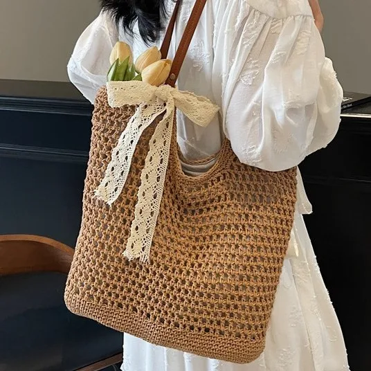 

Seaside Vacation Large-capacity Hand-held Woven Bag Women's 2025 New Fashion Hollow Crochet Casual Shoulder Beach Bag
