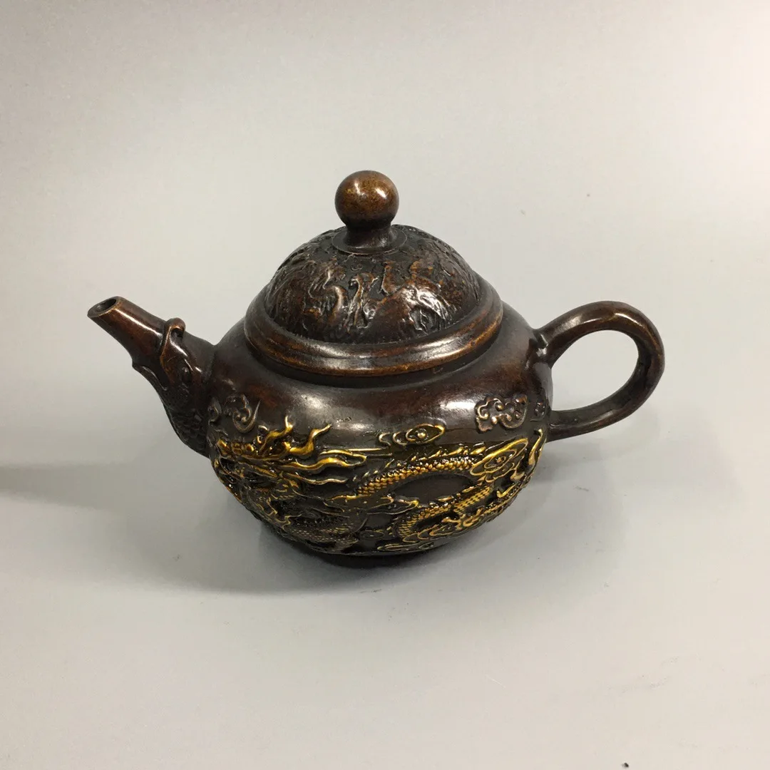 

Pure copper gilt teapot dragon and phoenix teapot wine pot Gilded brass with gold plating dance pot handicraft ornament