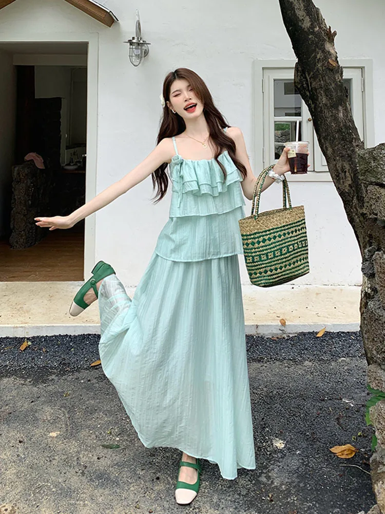 

Ruffle edge off shoulder flower suspendershirt for women's summer new design sense long skirt temperament and fashion set