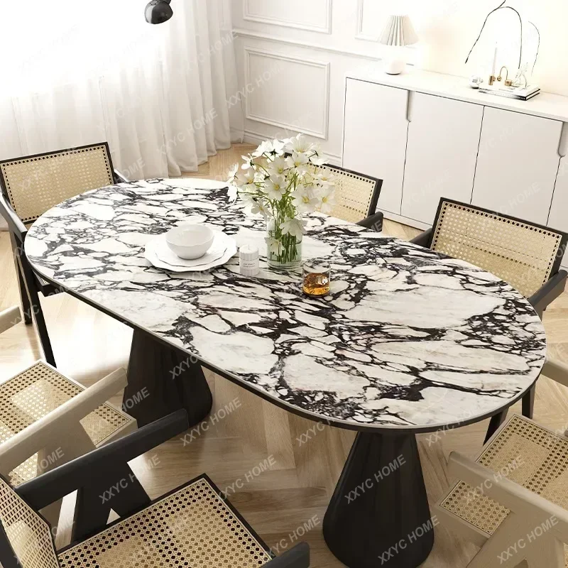 

Stone dining table cream style modern retro oval small apartment marble dining table chairs