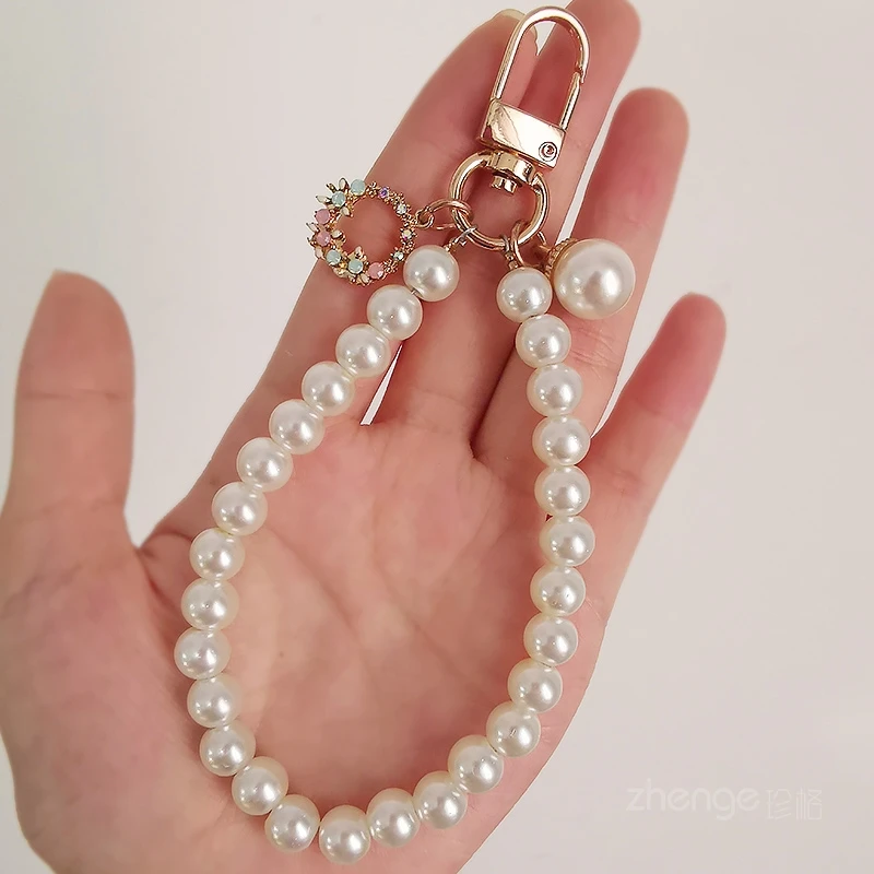 

Женский браслет из искусственного жемчуга на ремешке