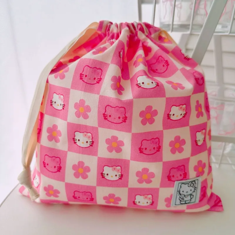 Hello Kitty tissu mode Art Bundle sac de rangement cosmétiques stockage à la main sac décoratif cordon voyage Portable en gros