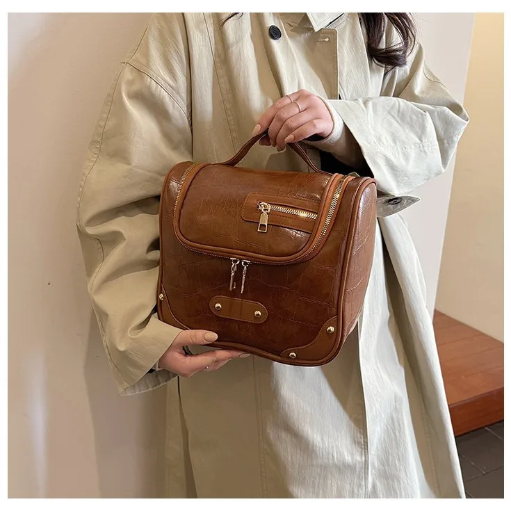 PU leather stitched women's handbag for casual use, high-end travel and grooming storage, portable bag