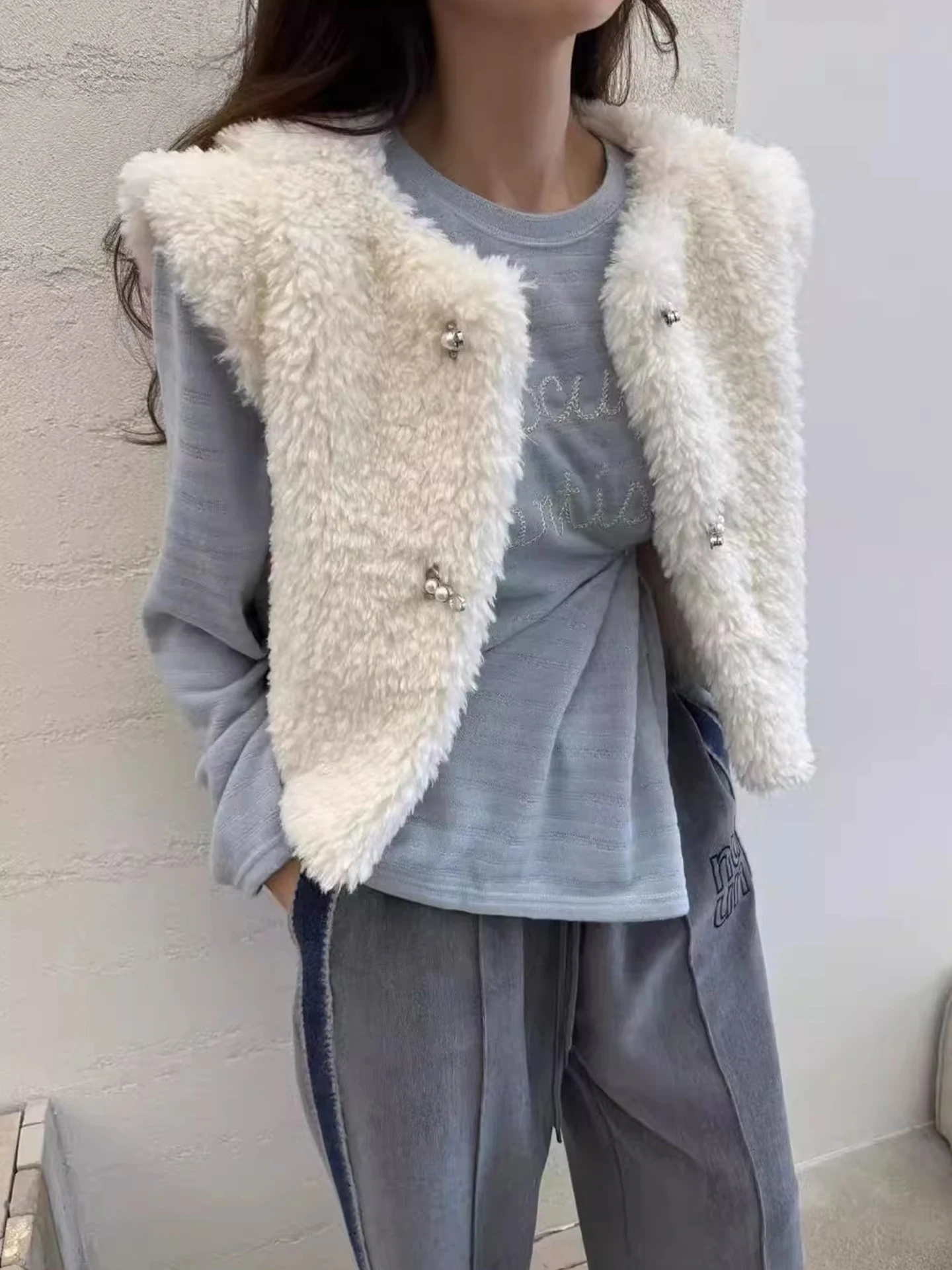 

Clothland Women Elegant Fur Waistcoat Pearl Button Sleeveless Vest Jacket White Black Outwear Coats Mujer MA171