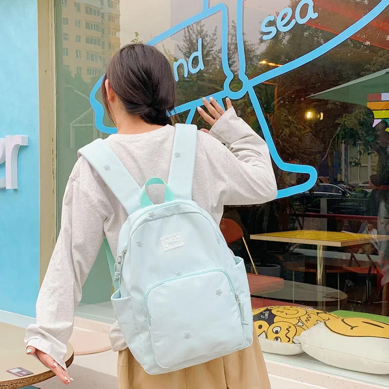 Japanese StyleinsSolid color simple backpack for women, stylish and lightweight school bag for middle and high school students,