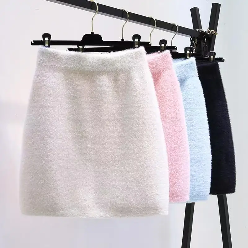 Falda de invierno para mujer, falda gruesa con forro polar, falda de Color sólido con temperamento a la moda, nueva falda ajustada tejida de piel sintética de visón con un personaje