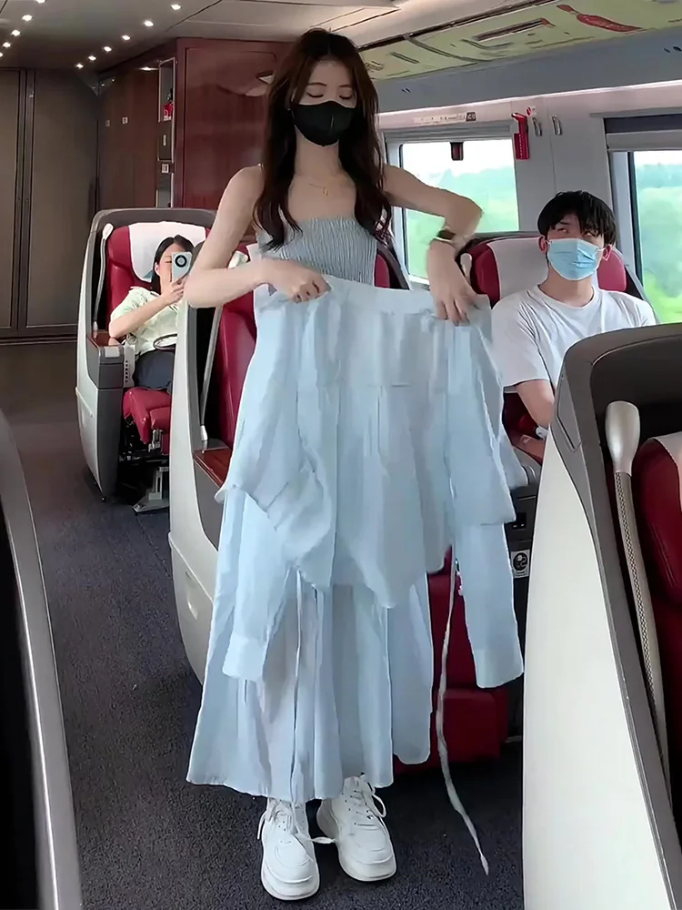 

Модный летний комплект для женщин: новинка 2026 года, защита от солнца, топ на бретельках и юбка, комплект из двух предметов из полиэстера для молодых женщин