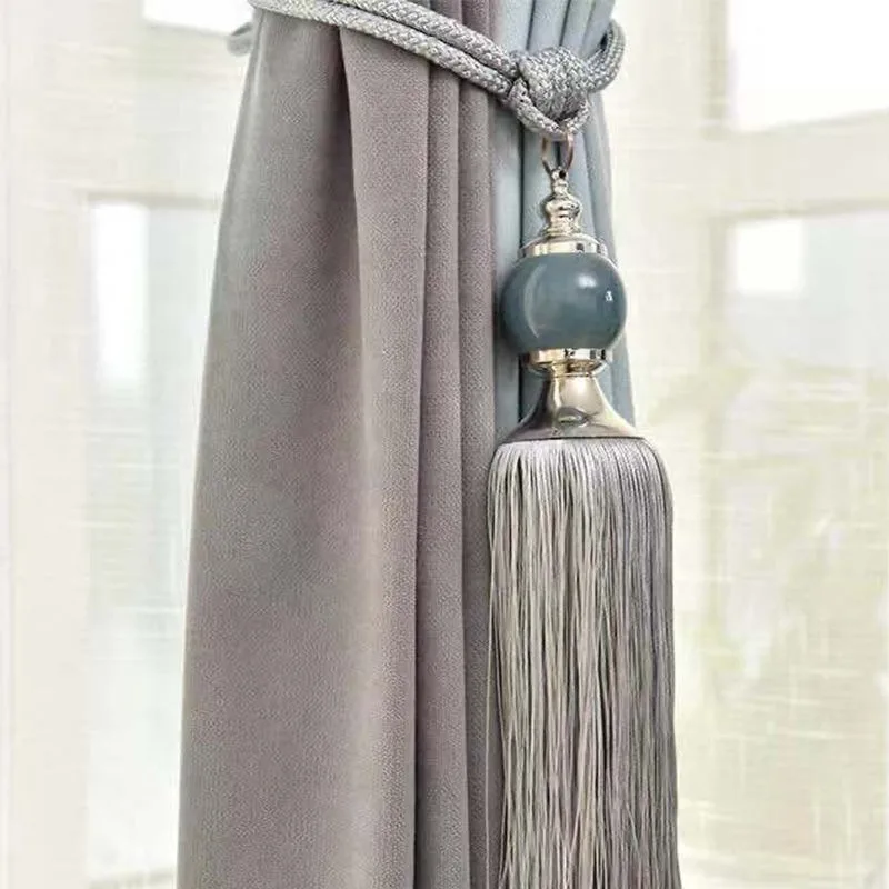 Curtain jade ball tieback: Tassel-adorned, elegant jade accents.Elevate living rooms—chic,durable,adds luxury to your curtains.