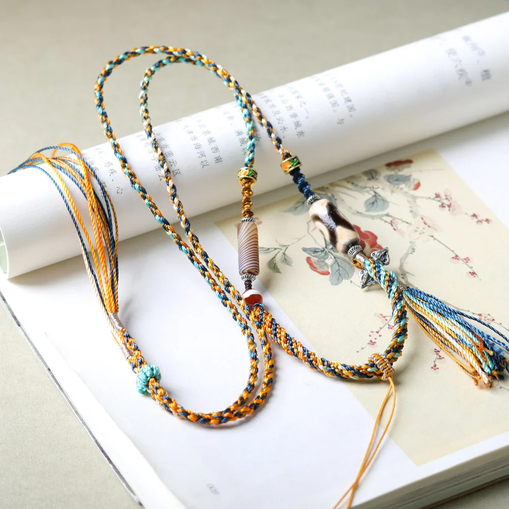 

Original design Tibetan jewellery three-eyed dzi entangled silk agate Sanqi silver universal pendant rope Wenchuan lanyard