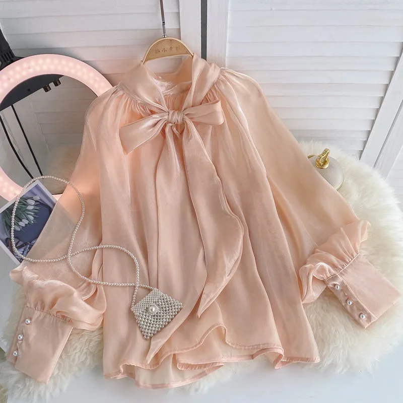 

Women Blouses Solid Shirts Bow Pearl Puff Sleeves Round Neck Wide Waisted Slight Strech Loose Fit Office Lady Casual 2026 Autumn