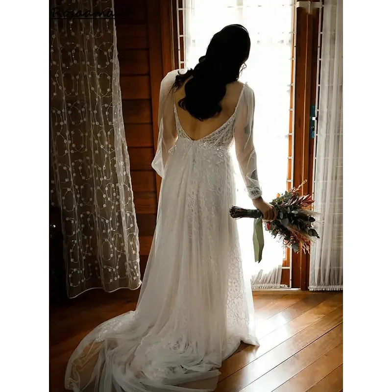 หรูหราแขนยาวไข่มุกประดับด้วยลูกปัด A-Line ชุดแต่งงาน Backless Appliques ลูกไม้ชุดเจ้าสาว Robe De Mariée