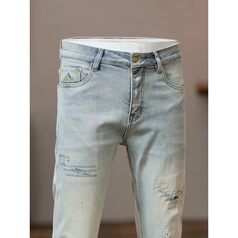 

Retro light colored jeans for men, nostalgic, slim fit, small feet, American street style, cool and trendy, scratch design pants