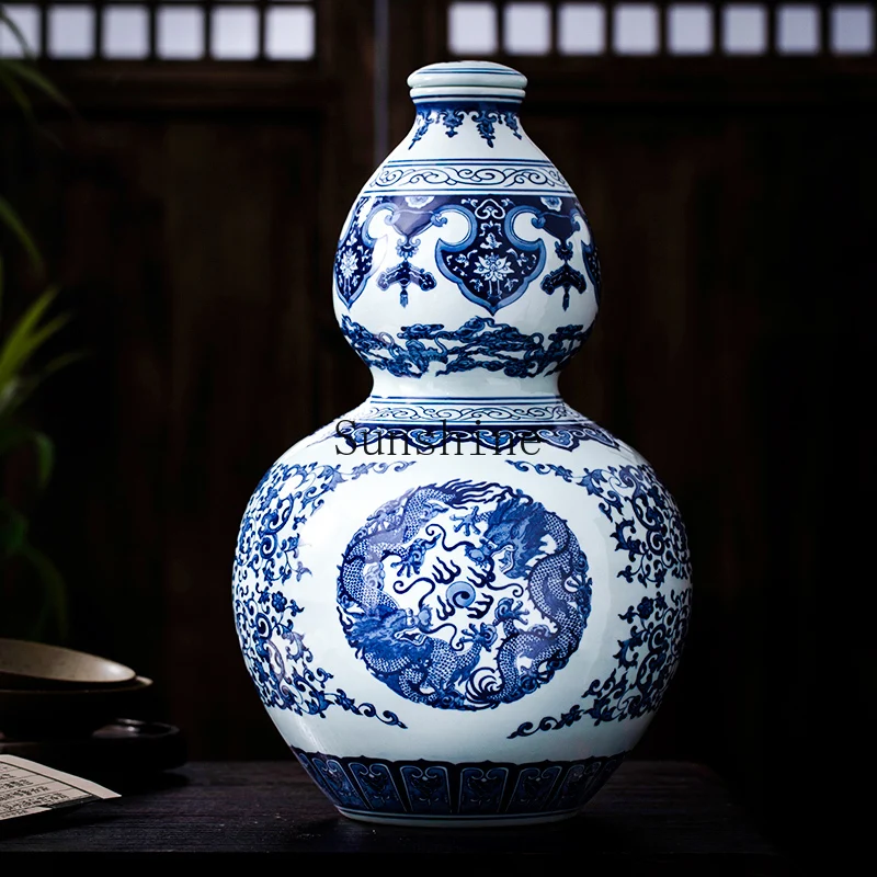 Tarro de vino espumoso de cerámica pintado a mano de alta gama, calabaza sellada, hogar Baijiu azul y blanco