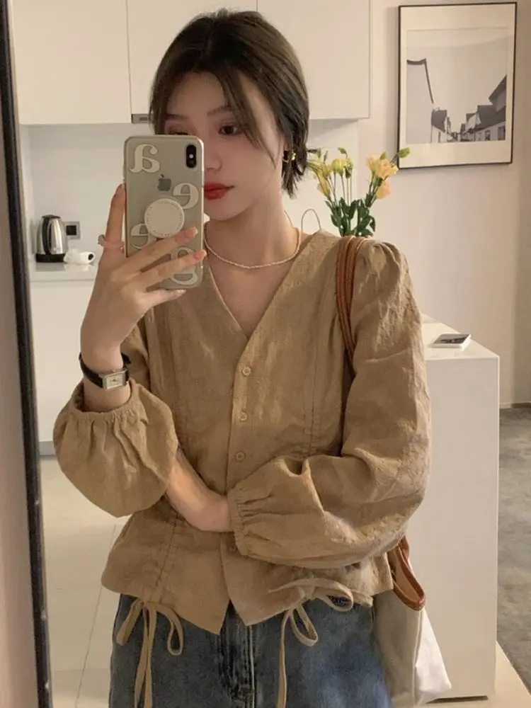 V-neck Shoulder Shirt for Women in Spring Autumn with A Fashionable Design Drawstring Display Long Sleeved Top