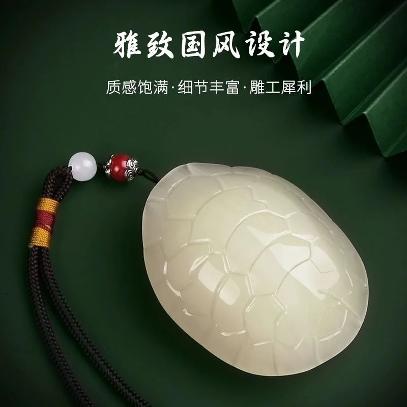 

Hetian jade turtle shell "Wealth to the World" white jade hand-held ornament for personal use and desktop decoration