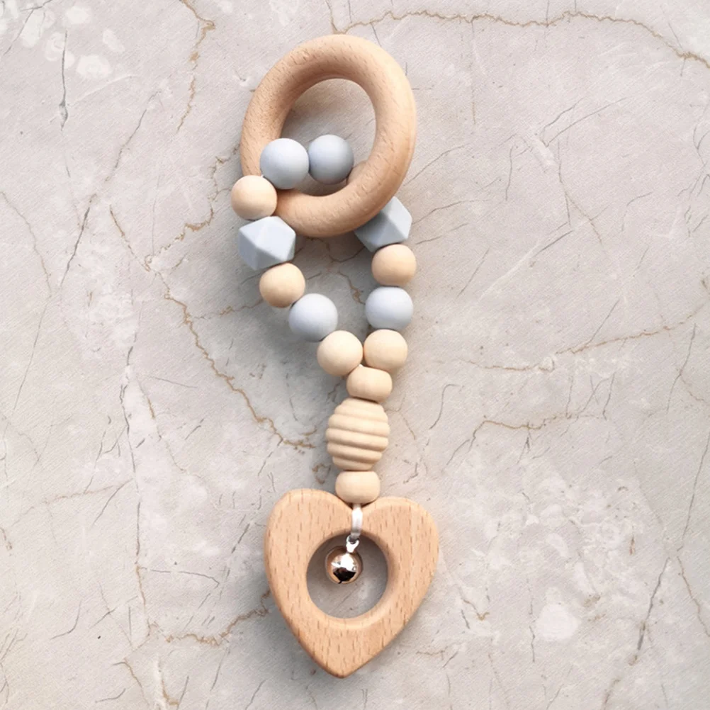 ยางกัดเด็กแบบมีเสียง ทำจากไม้และซิลิโคน พร้อมจี้รูปทรงต่างๆ ช่วยเสริมพัฒนาการทางการเรียนรู้และการพัฒนาสมอง สำหรับเด็กแรกเกิดและเด็กเล็ก