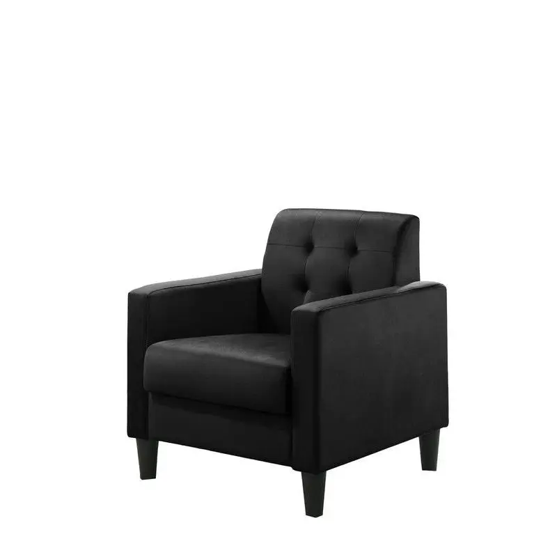 Black velvet upholstered armchair with tufted trim, suitable for living rooms