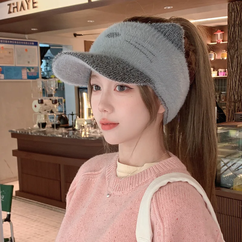 Autumn and winter knitted wool cap Warm plush hollow cap Cat-shaped wool cap Women\'s duck tongue cap Knitted ponytail cap