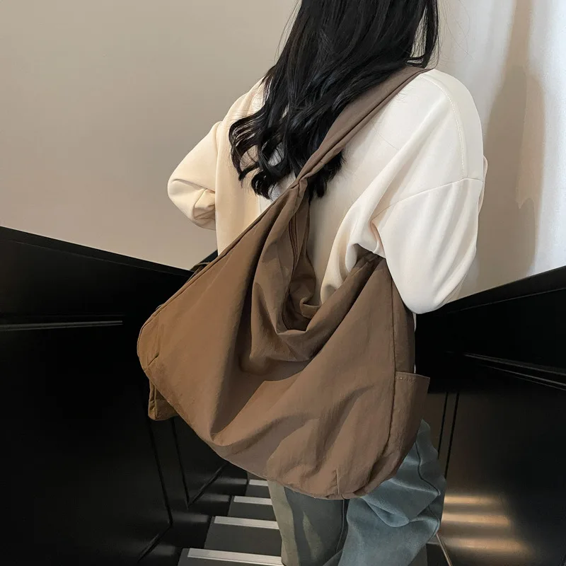 

Solid color lazy style tote bag for women 2025 new backpack, large capacity commuting bag, versatile crossbody bag