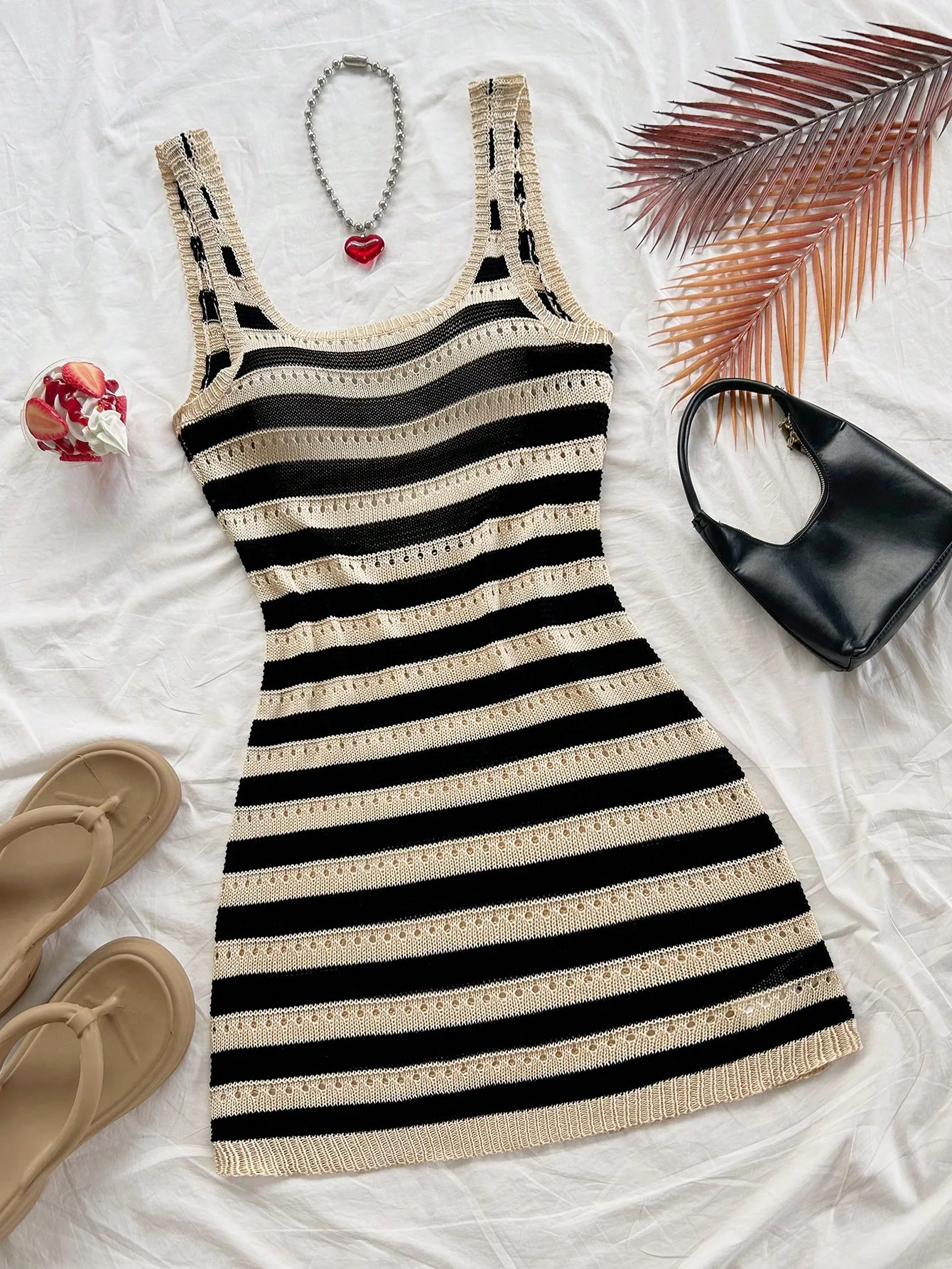 

Black & Cream Striped Knit Mini Dress with Hollow-Out Detail and Adjustable Straps