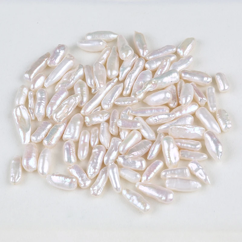 

Wholesale white long biwa pearl loose bead for making jewelry