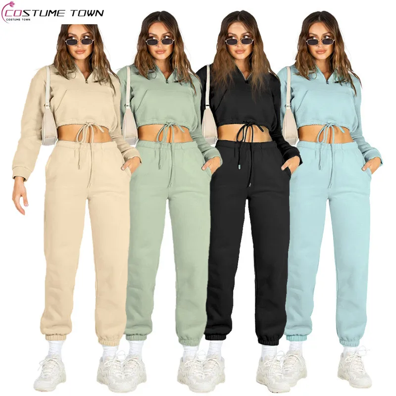 

European and American style autumn and winter solid color stand up collar zipper drawstring exposed navel top+casual pants set