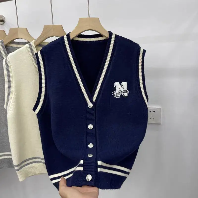 เสื้อกั๊กเสื้อกันหนาวแบบถักเลเยอร์คู่สไตล์เกาหลีสำหรับผู้หญิงคาร์ดิแกนทรงหลวมและไฮเอนด์สไตล์ใหม่สำหรับฤดูใบไม้ผลิและฤดูใบไม้ร่วง