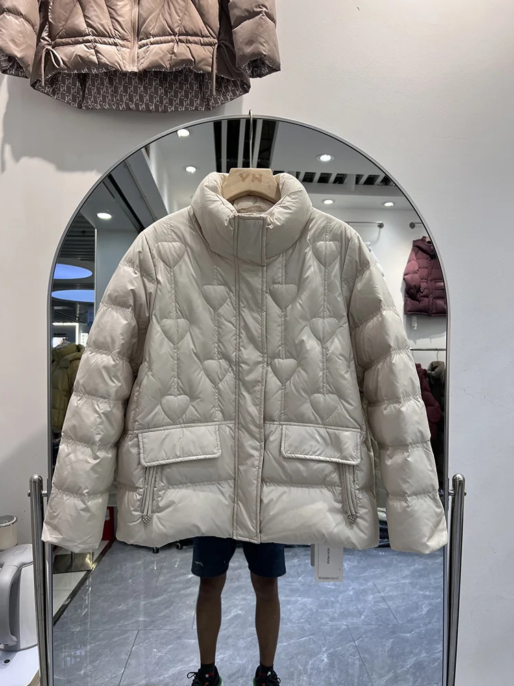 سترة نسائية شتوية جديدة لعام 2025 النسخة الكورية القصيرة بياقة واقفة على شكل قلب سترة كاجوال متعددة الاستخدامات من ريش البط الأبيض
