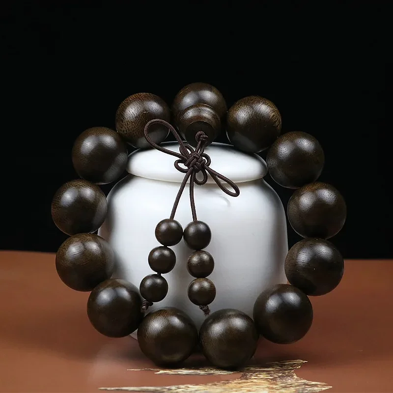 

Indonesia Tarakan bracelet black oil old materials milk fragrance Buddha with discipline beads