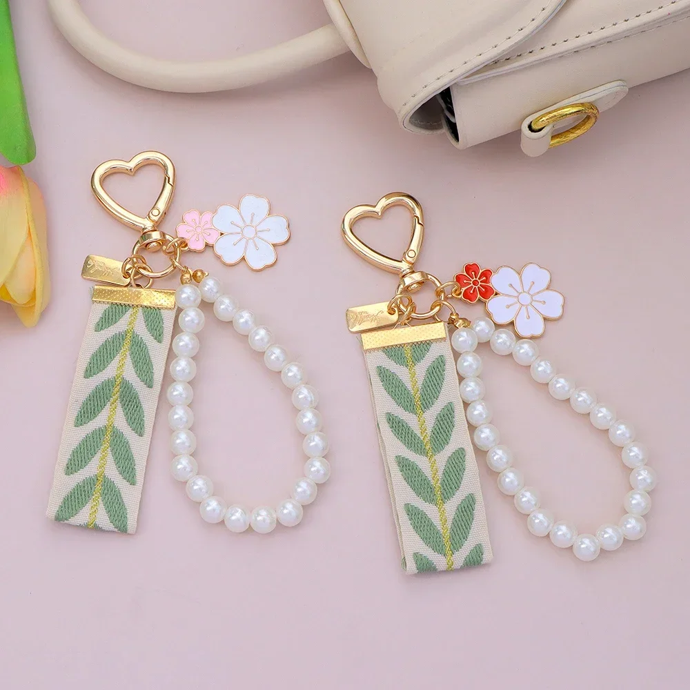 Cute Sakura Pearl Keychain Cute Flower Webbing Keyring Handbag Pendant Headphone Cover Jewelry Car Key Holder Accessories