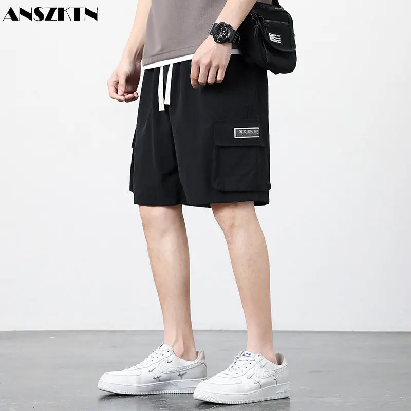 ANSZKTN Men tooling summer outdoor big pockets trend loose leisure waterproof sports breeches cargo shorts