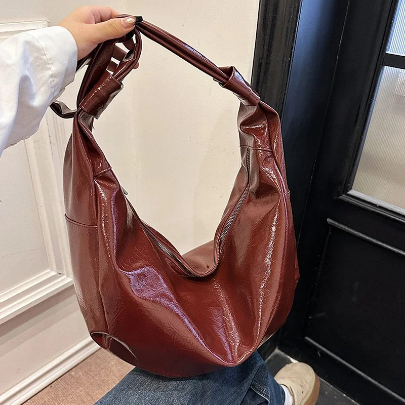 

PU Zipper 2024 New Product Handheld Car Suture Solid Color Fashion Crossbody Bag Soft Simple Versatile Designer Shoulder Bag