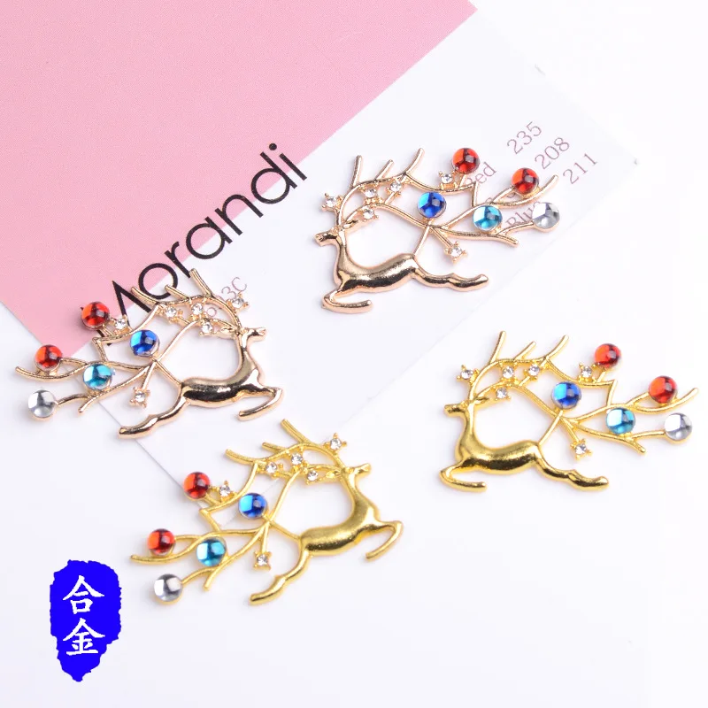 

100 pieces set material new four-color crystal deer handmade brooch clothing bag material spot wholesale sale